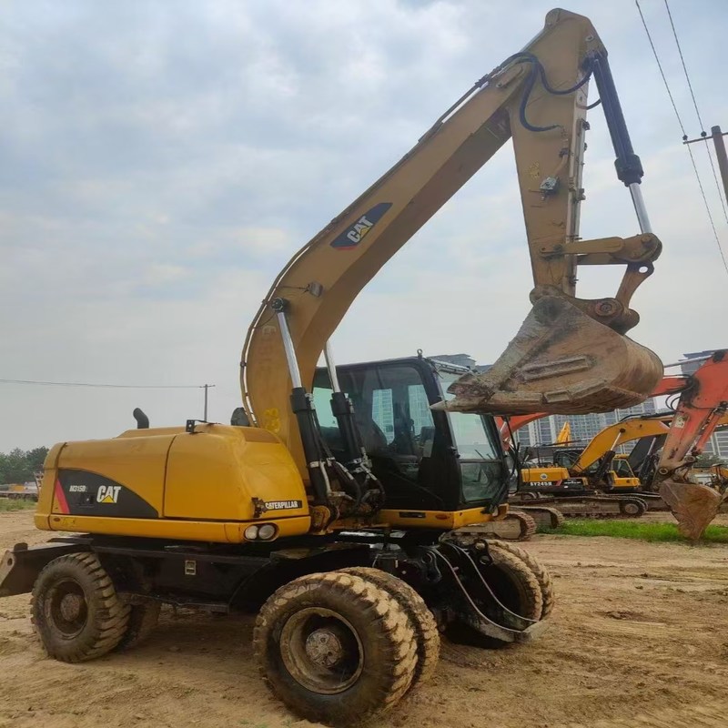 Μεταχειρισμένος εκσκαφέας Γνήσιος Cat M315D Μεταχειρισμένος 15ton Τροχοσκαφέας με κάδο 0,61m3