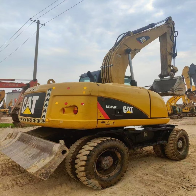 Μεταχειρισμένος εκσκαφέας Γνήσιος Cat M315D Μεταχειρισμένος 15ton Τροχοσκαφέας με κάδο 0,61m3