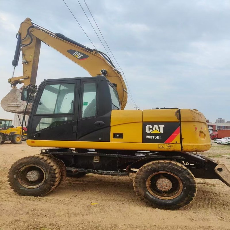 Μεταχειρισμένος εκσκαφέας Γνήσιος Cat M315D Μεταχειρισμένος 15ton Τροχοσκαφέας με κάδο 0,61m3